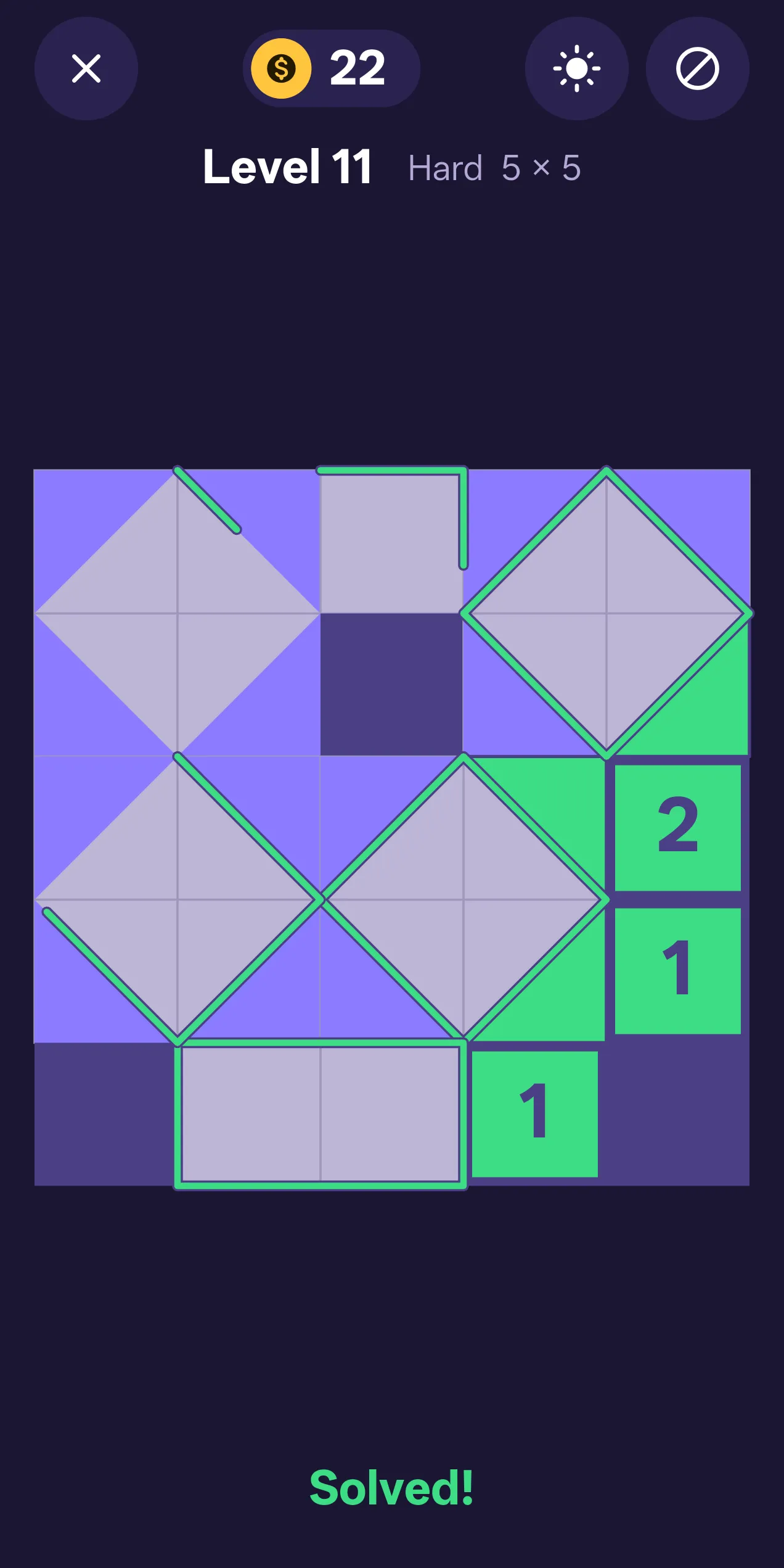 The same level solved: each number turns green with the triangles it counts, and each white area is outlined in green to show it is a rectangle.